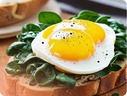 Eggs and spinach on sourdough toast